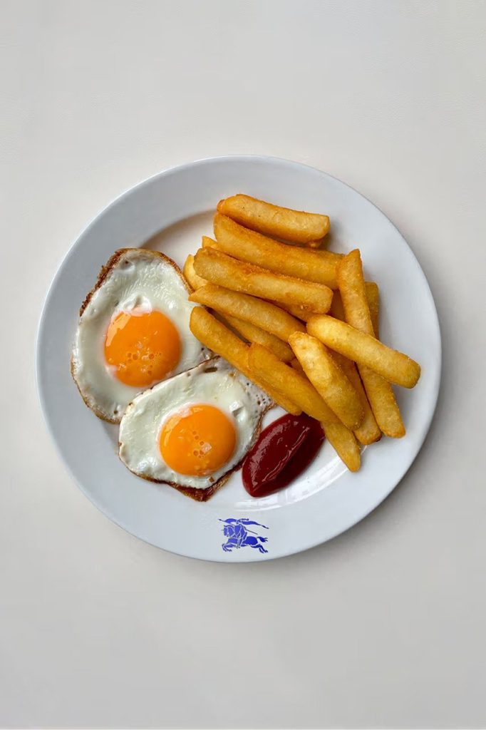 A Burberry x Norman's plate of egg and chips