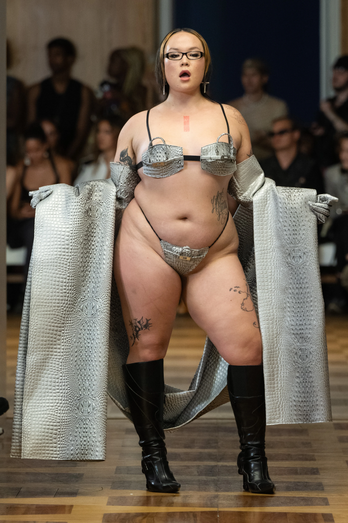 A Namalia model wearing an ensemble of reconstructed Birkin bags
